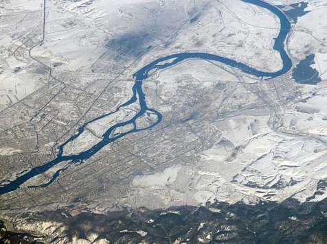 Космонавт на орбите снял заснеженный Красноярск и показал задымленные места. Фото: «Роскосмос» / vk.com