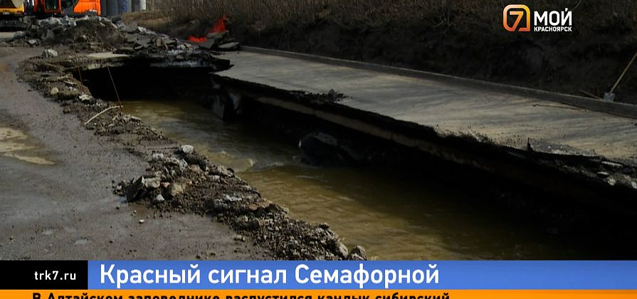 После провала асфальта у Мичуринского моста движение встало